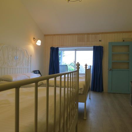 Sunnyrain Hostel Цзюфэнь Экстерьер фото