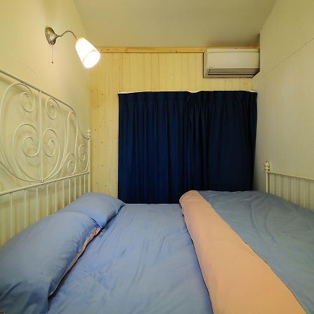 Sunnyrain Hostel Цзюфэнь Экстерьер фото