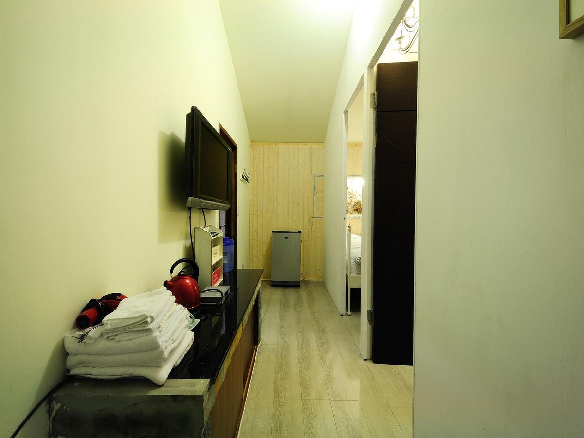 Sunnyrain Hostel Цзюфэнь Экстерьер фото